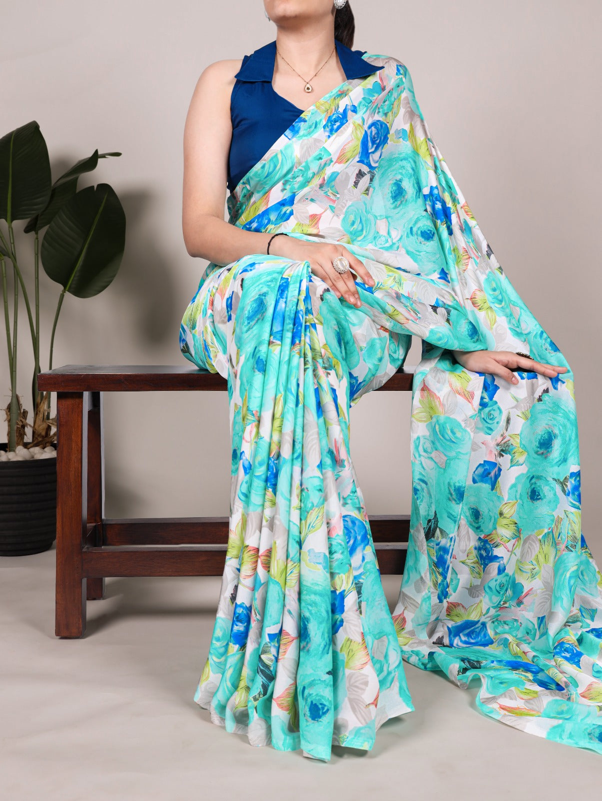 Aqua Blue Floral Printed Georgette Saree – Lightweight & Breezy