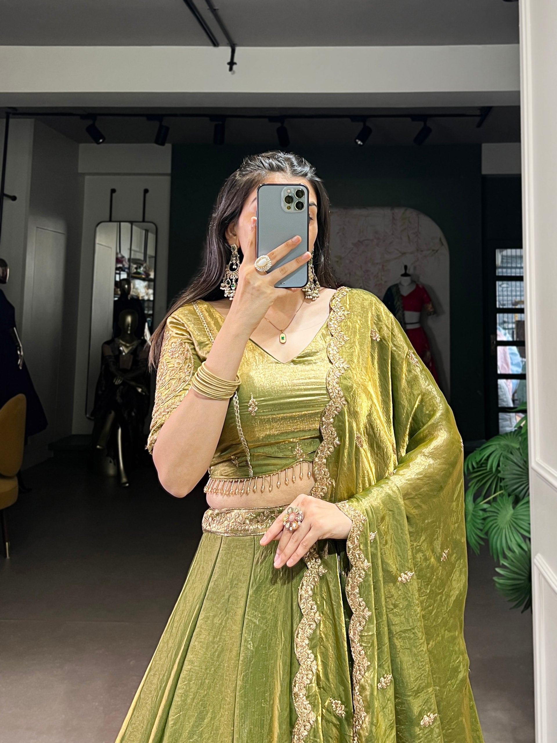 Elegant Mehndi Green Lehenga with Golden Lace Detailing