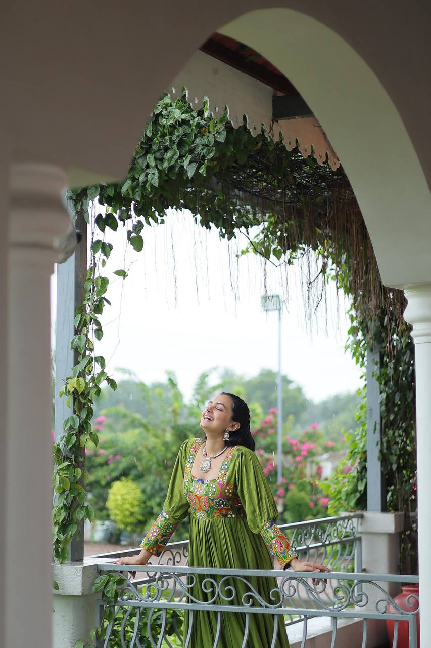 Glamorous Wine Rayon Kutchi Work Navratri Gown For Women