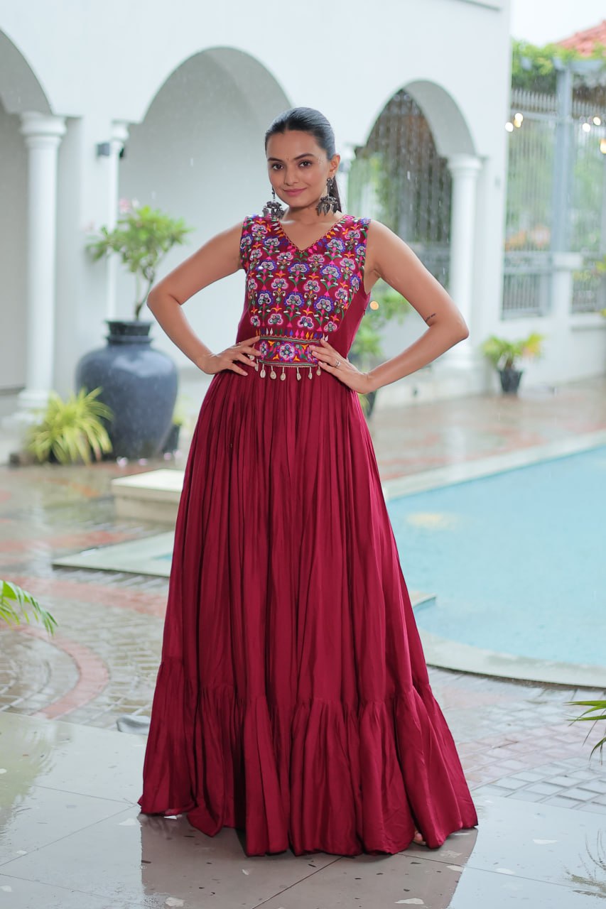 Pretty Maroon Rayon Mirror Work Navratri Special Gown For Women