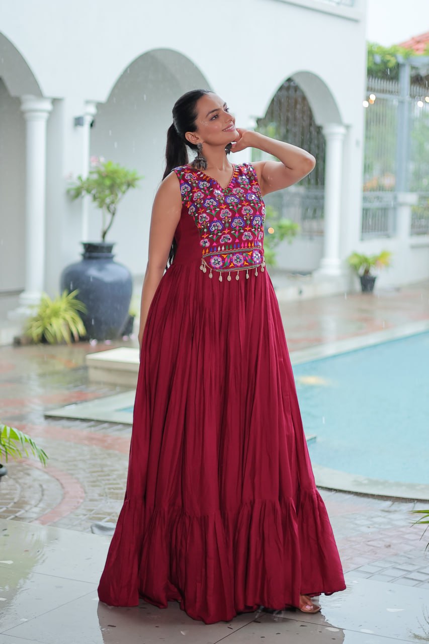 Pretty Maroon Rayon Mirror Work Navratri Special Gown For Women